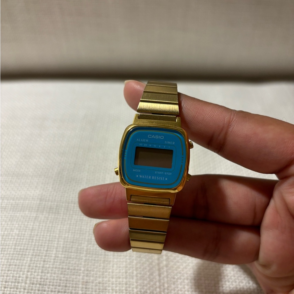 Casio Gold Smartwatch with Blue Face